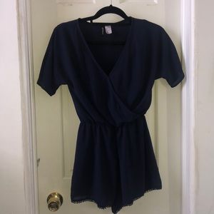 Navy Romper with eyelet lace trim